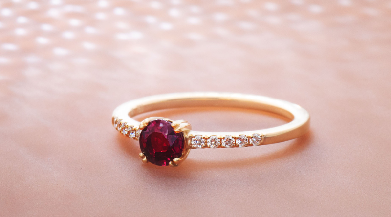 yellow gold ring with ruby and diamonds pink surface