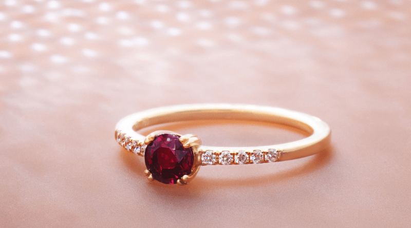 gold jewelry with diamonds and ruby ring