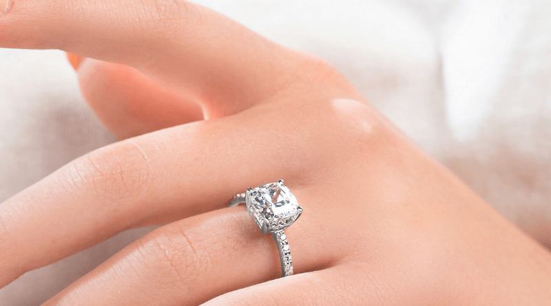 white gold ring on female finger