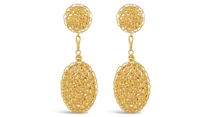 elegant premium gold earrings on white background