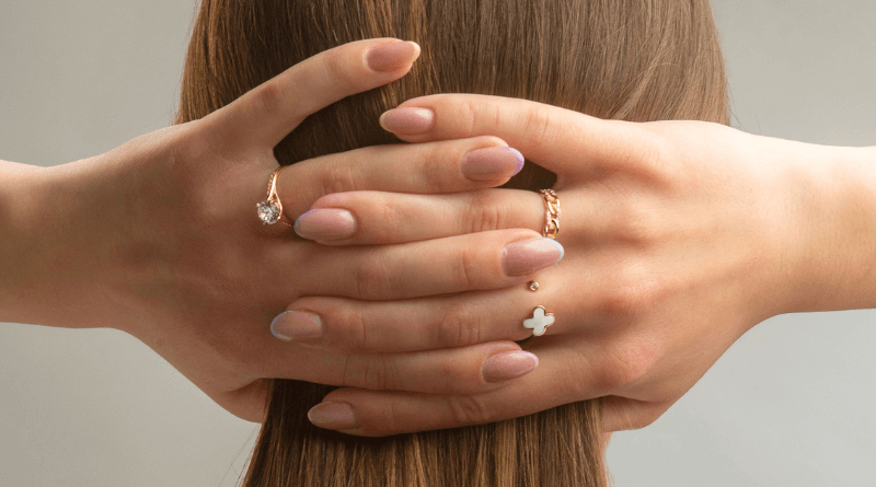 premium dodic gold rings on woman hands