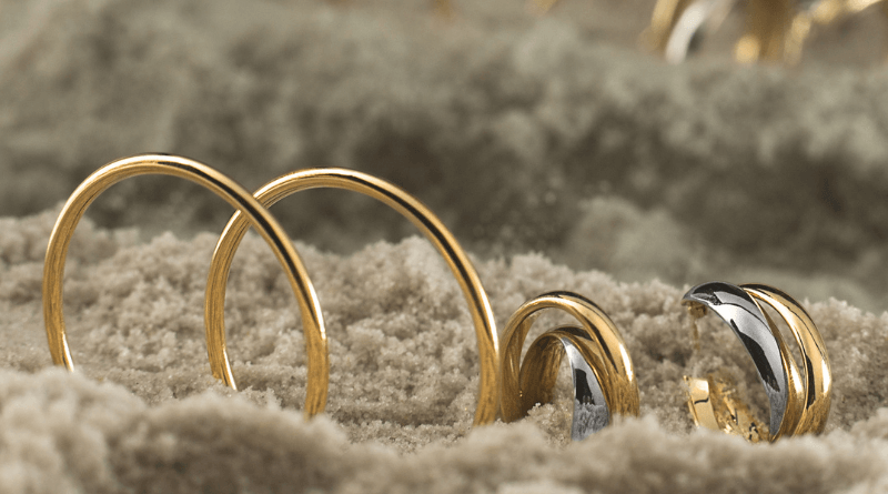 gold jewelry on a beach