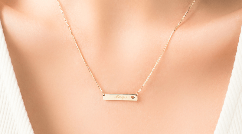 gold necklace with bar with name engraved