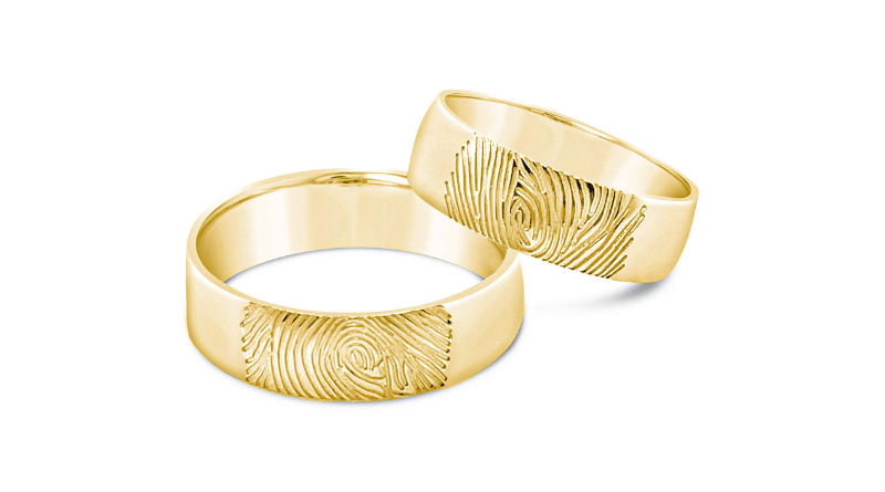 Zlatarna Dodic Fingerprint wedding rings on white surface