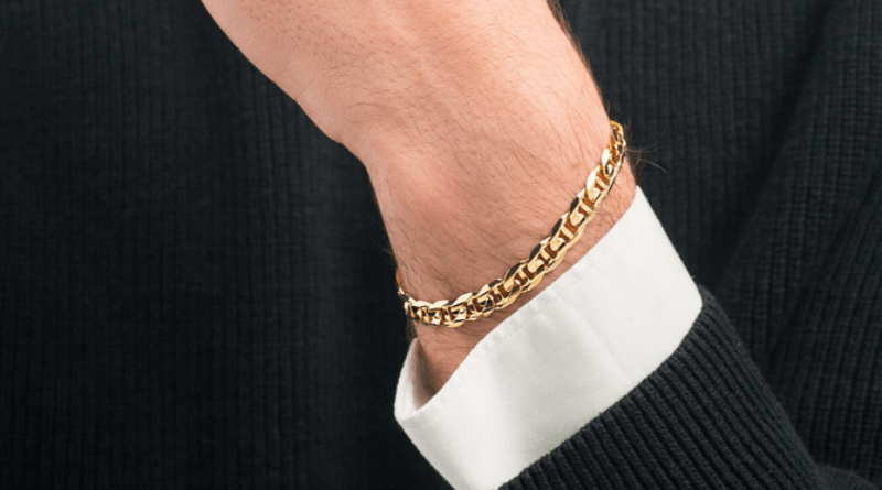 gold bracelet on man model