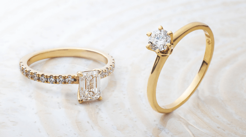 two gold rings with diamonds