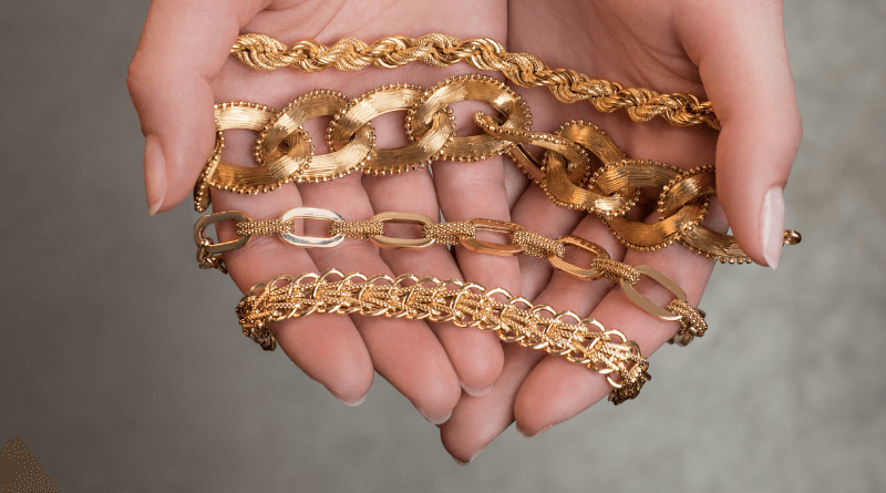 premium gold bracelets in womans palms