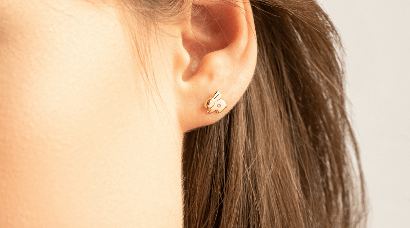 gold earrings children small flowers on ear