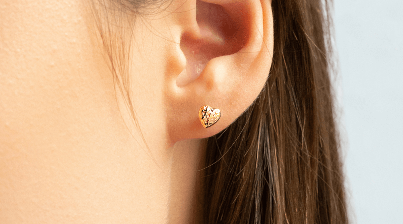 gold earrings children small hearts on ear