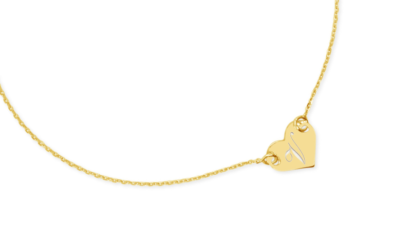 personalized jewelry 14kt gold names initials engraved on white background